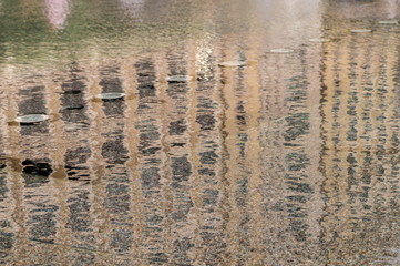 Reflections in a fountain in Canary Wharf