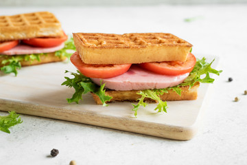 waffle sandwich with ham and tomato