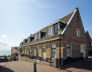 Houses at the 'Staverse hoogte" (streetname) at the city of Urk, former island in the 'Zuiderzee' (South sea) yet a city at the border of the 'IJsselmeer' (Lake IJssel), Urk, NLD