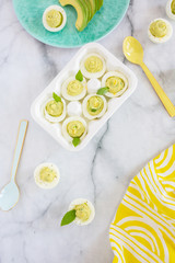 Avocado Deviled Eggs on Blue Plate