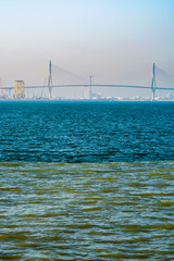 Halocline in water, visible border of fresh river water and salted ocean water with high salinity in Gulf of Cadiz, Andalusia, Spain