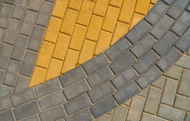 yellow and grey paving tiles for background or texture