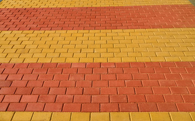 yellow and red brown paving tile for background or texture