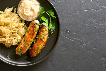 Grilled sausages with sauerkraut and horseradish