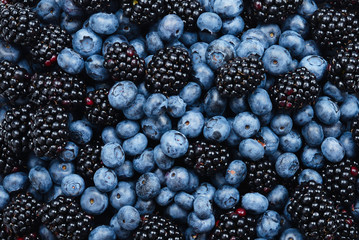 Blackberry and  blueberry background. Top view.