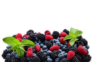 Blackberry, raspberry, blueberry and mint background.