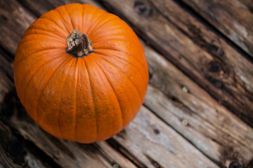 pumpkin on wooden table
