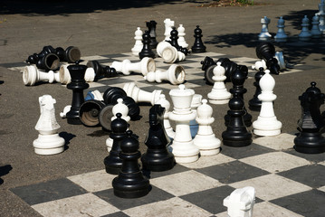 large chess pieces in a city park