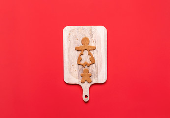 Gingerbread girl cookie and little boy cookie. Christmas concept
