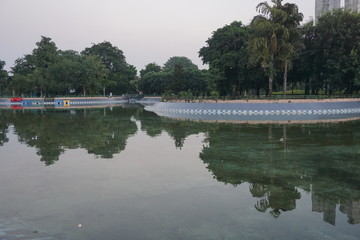 Water body in a park reflection of trees in lake