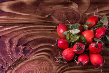 rose hip on a wooden background
