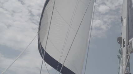 White sail sways from the wind on a yacht. S-Log3 S-Gamut3 Cine