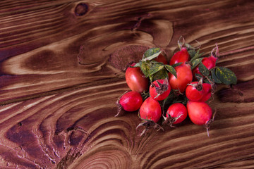 rose hip on a wooden background