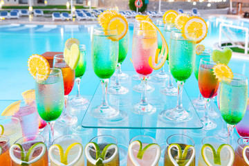 Pyramid of different coloured alcohol and non-alcohol cocktails