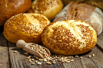 loaf of bread on wooden background, food closeup.Fresh homemade bread.French bread. Bread at leaven. Unleavened bread.Ciabatta bread.