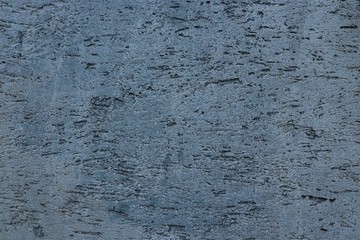rough uneven surface of dark gray-blue color