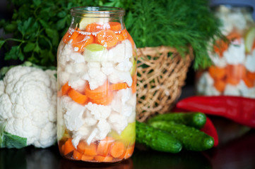 Raw cauliflower, carrots, cabbages