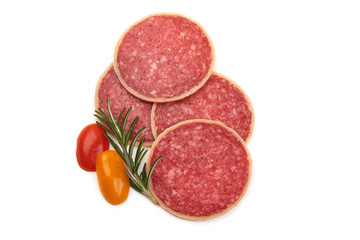 Slices of smoked salami with herbs and spices, isolated on white background