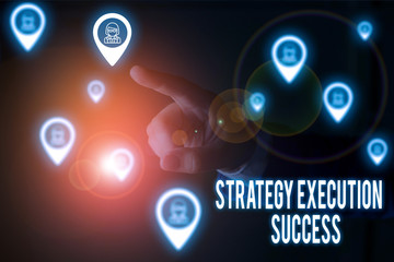 Writing note showing Strategy Execution Success. Business concept for putting plan or list and start doing it well Male wear formal work suit presenting presentation smart device