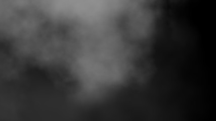 Fototapeta na wymiar Close up of steam smoke on black background. Smoke stock image.Smoke cloud. Fog clouds, smoky mist and realistic cloudy effect. Condensation smoke effects, ashes mist texture or toxic gas.