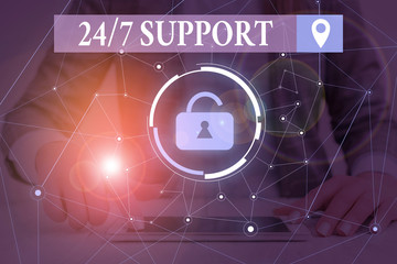 Text sign showing 24 Or 7 Support. Business photo text Giving assistance to service whole day and night No downtime Woman wear formal work suit presenting presentation using smart device