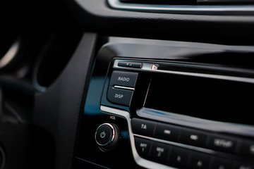 Radio buttons in the modern car. Multimedia player in automobile.