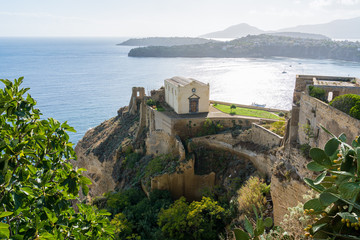 Fototapeta na wymiar Panoramic sight of the beautiful island of Procida with Santa Margherita Nuova Church, near Napoli, Campania region, Italy.