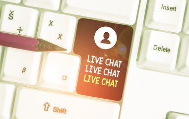 Conceptual hand writing showing Live Chat Live Chat Live Chat. Concept meaning talking with showing friends relatives online White pc keyboard with note paper above the white background