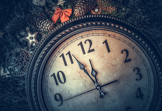 Old Clock Shows Midnight. New Year's Still Life.