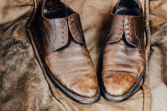 vintage leather brown men shoes, dangled retro.