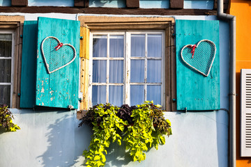 Wooden shutter on window in Colmar France - obrazy, fototapety, plakaty