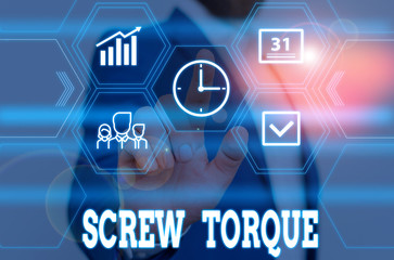 Writing note showing Screw Torque. Business concept for measure of the twisting force required to spin the nut Male wear formal work suit presenting presentation smart device
