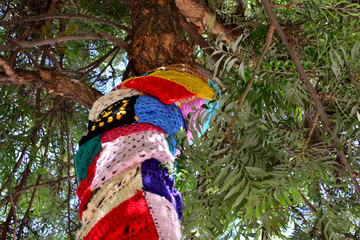 wearing trees with colorful crochet