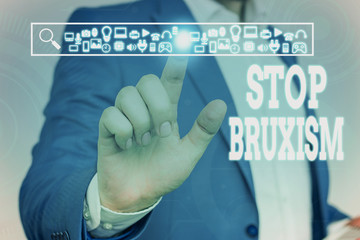 Handwriting text Stop Bruxism. Conceptual photo put an end to a condition which you grind or clench the teeth Male human wear formal work suit presenting presentation using smart device