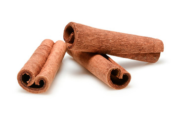 Cinnamon sticks for cooking and cosmetics. Close up macro isolated on white background with shadow. Full depth of field, high resolution.
