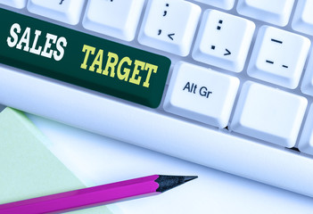 Conceptual hand writing showing Sales Target. Concept meaning specified amount of sales that a analysisagement sets for achieving White pc keyboard with note paper above the white background