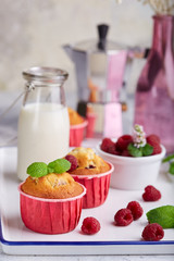 Muffins with raspberries. Delicious homemade sweet dessert. Coffee break