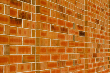 Orange color brick wall texture with 1/3 offset stagger brickwork pattern