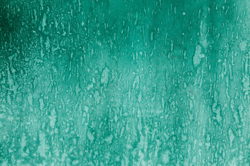 green texture on the wall with rust