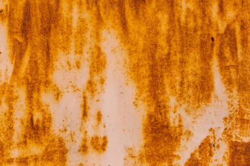 Rusty orange texture on the wall.