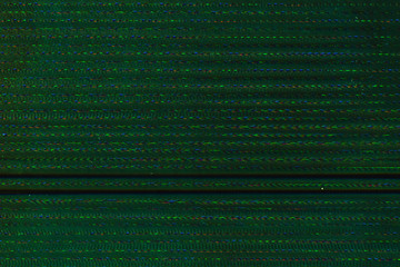 Glitch art. Pixel noise. Green striped pattern overlay.