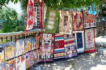 traditional Greek carpets hung on rope at Creta island of Greece
