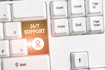 Conceptual hand writing showing 24 Or 7 Support. Concept meaning Giving assistance to service whole day and night No downtime White pc keyboard with note paper above the white background