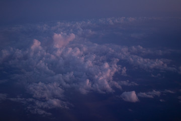Fototapeta na wymiar The sky with clouds from a flight