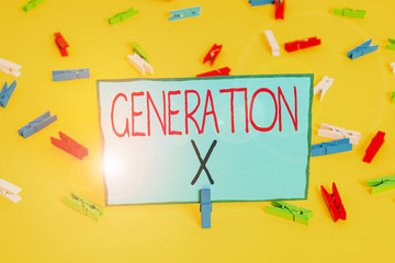 Text sign showing Generation X. Business photo showcasing the generation that born after that of the baby boomers Colored clothespin papers empty reminder yellow floor background office