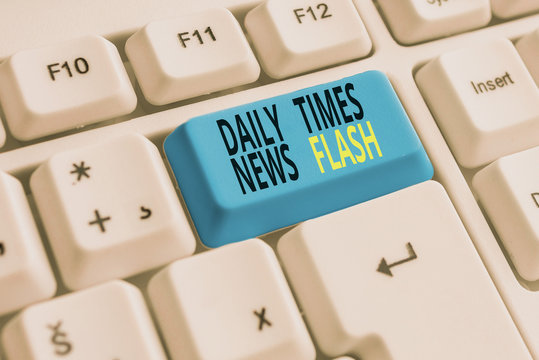 Text sign showing Daily Times News Flash. Business photo showcasing fast response to actions happened in article way White pc keyboard with empty note paper above white background key copy space