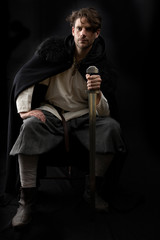 Dark-haired man in Viking costume