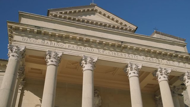 Basilica di San Marino with triangular roof under blue sky