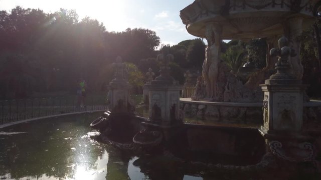 Fountain of Venus, Villa Doria Pamphili, Rome, Italy. Gimbal rotation with sparkles of the sun.