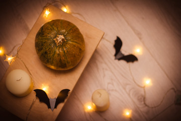 Halloween pumpkins, bats, candles and the lanterns